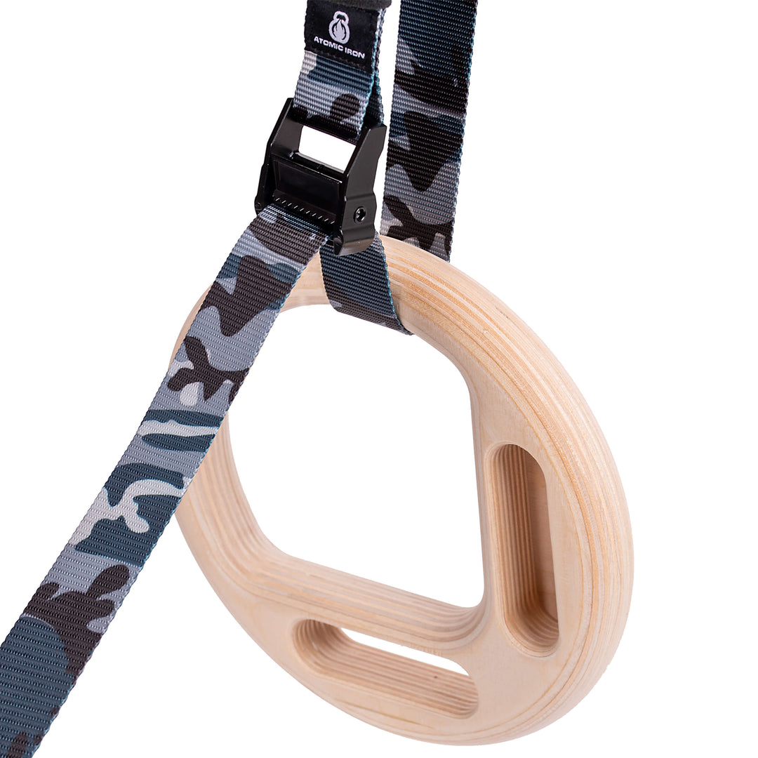 climbing rings with grey camouflage straps by atomic iron