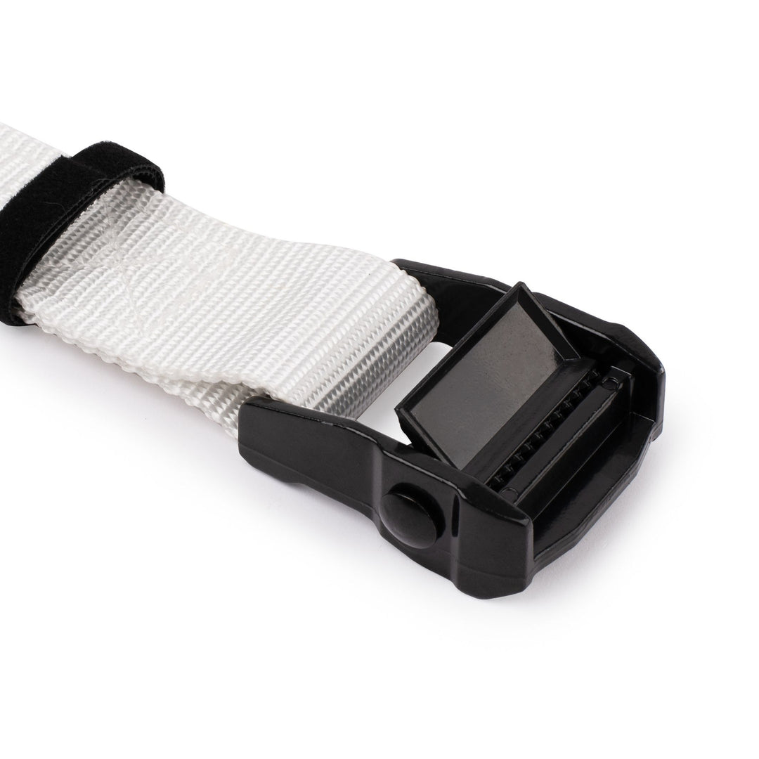 White gymnastic ring adjustable strap with black metal toothed cam buckle.