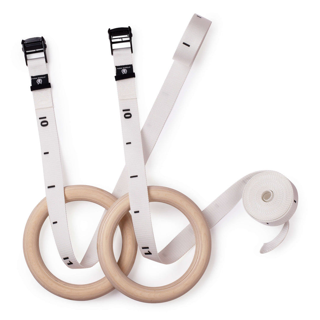 Gymnastics rings with numbered adjustable straps in white by Atomic Iron