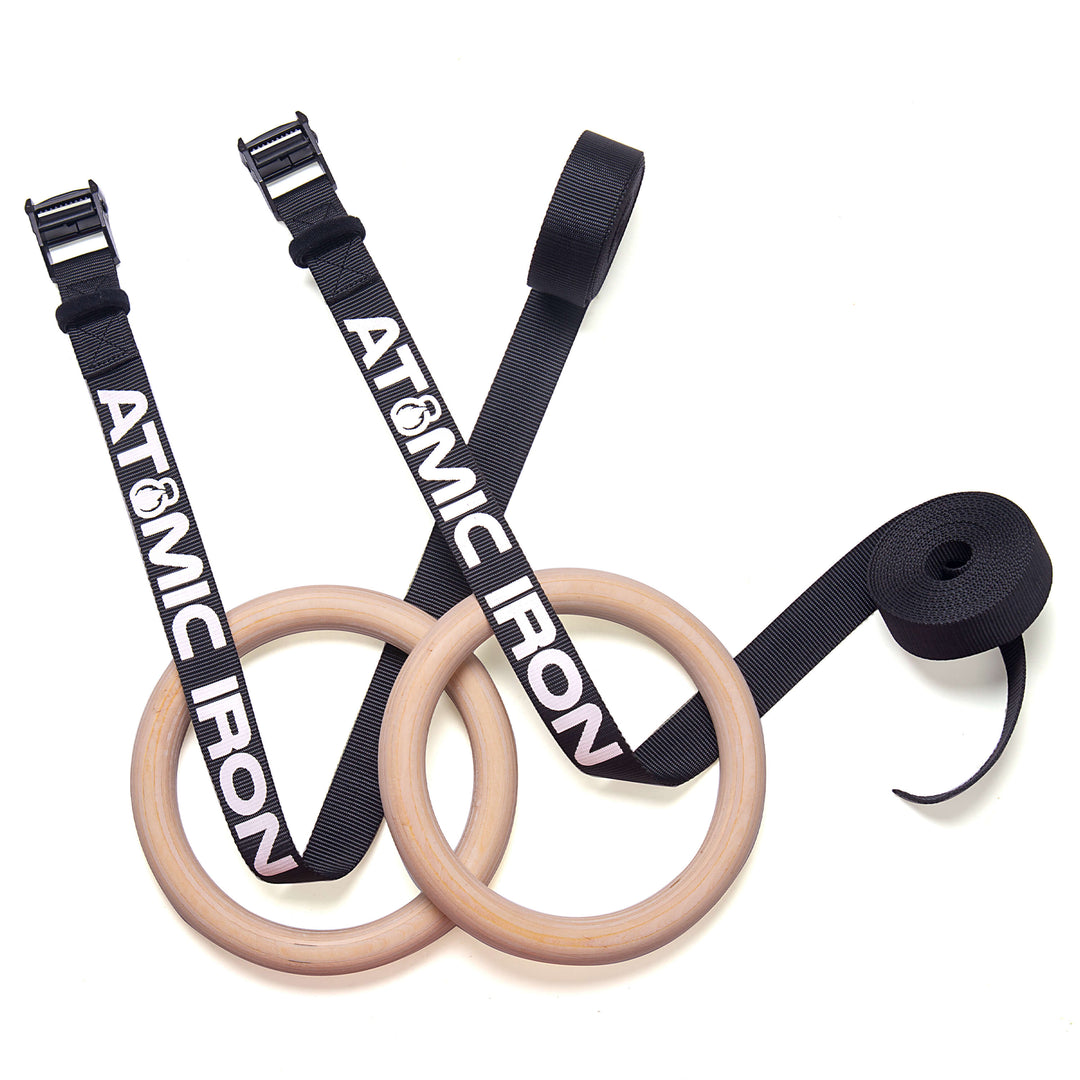 gym rings with black straps by Atomic Iron