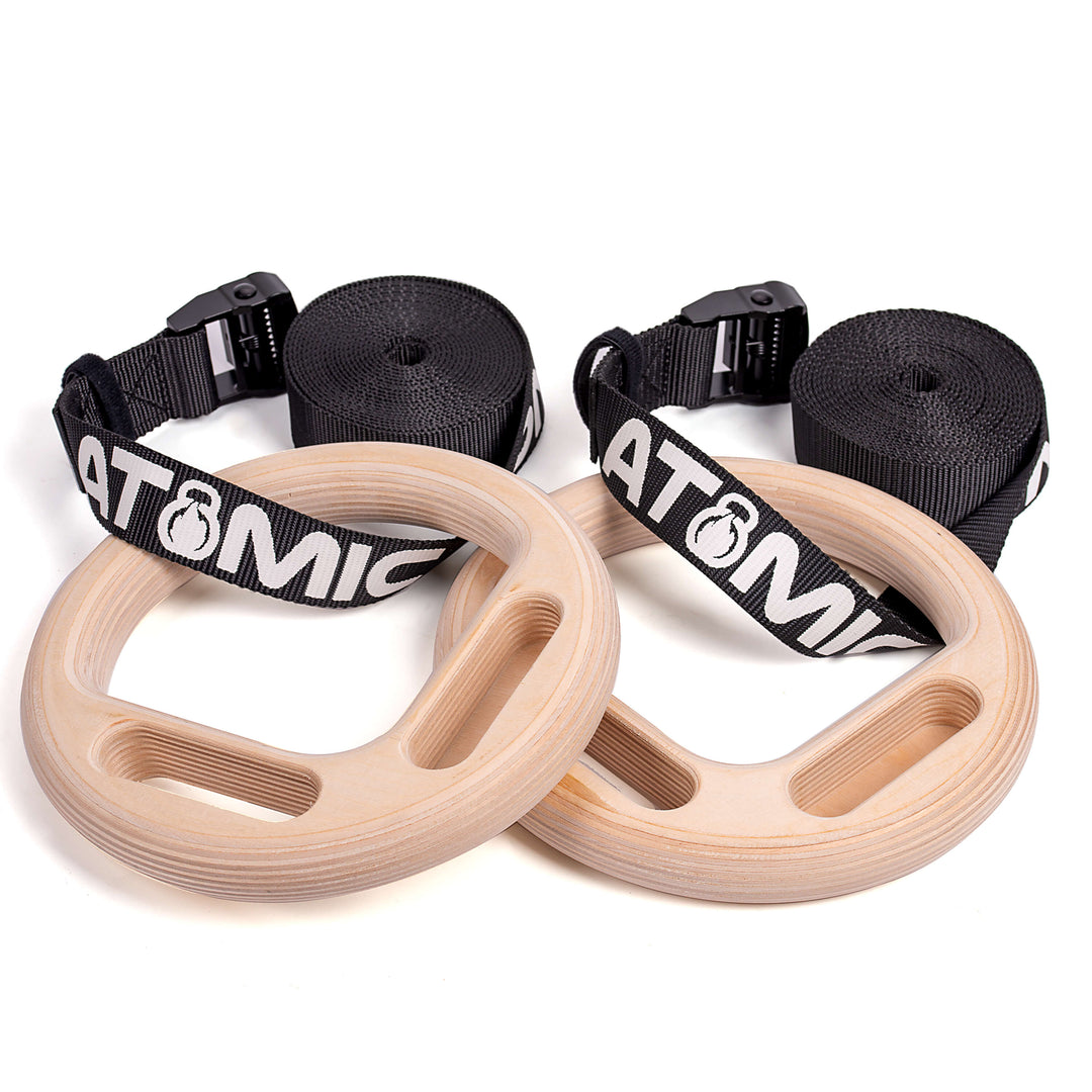 climbing rings with adjustable straps in black by atomic iron
