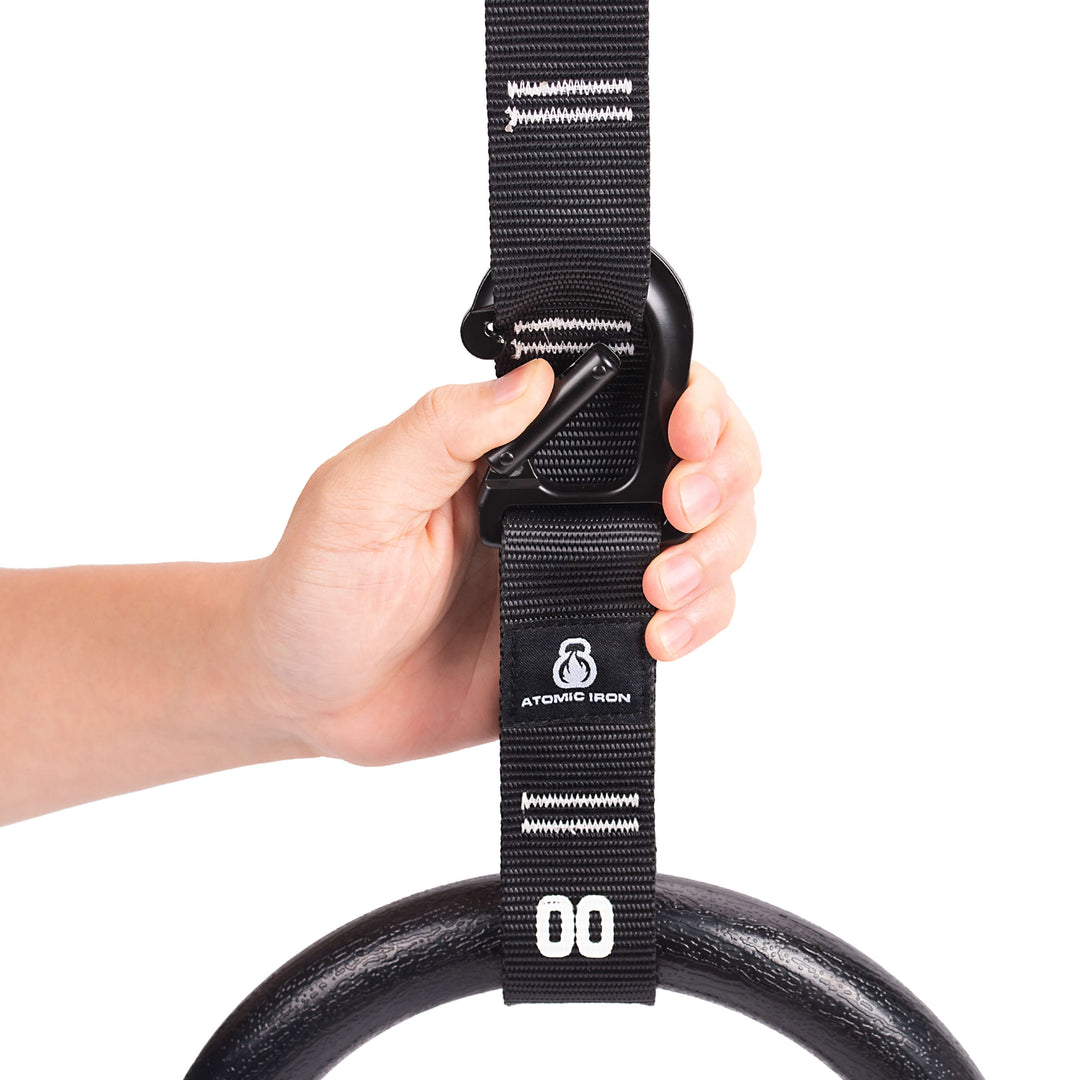 Premium outdoor calisthenics rings with numbered carabiner straps by Atomic Iron