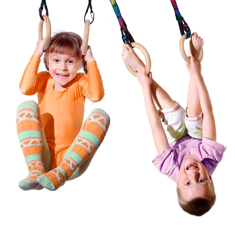 Kids playing on wooden gymnastic rings - Atomic Iron